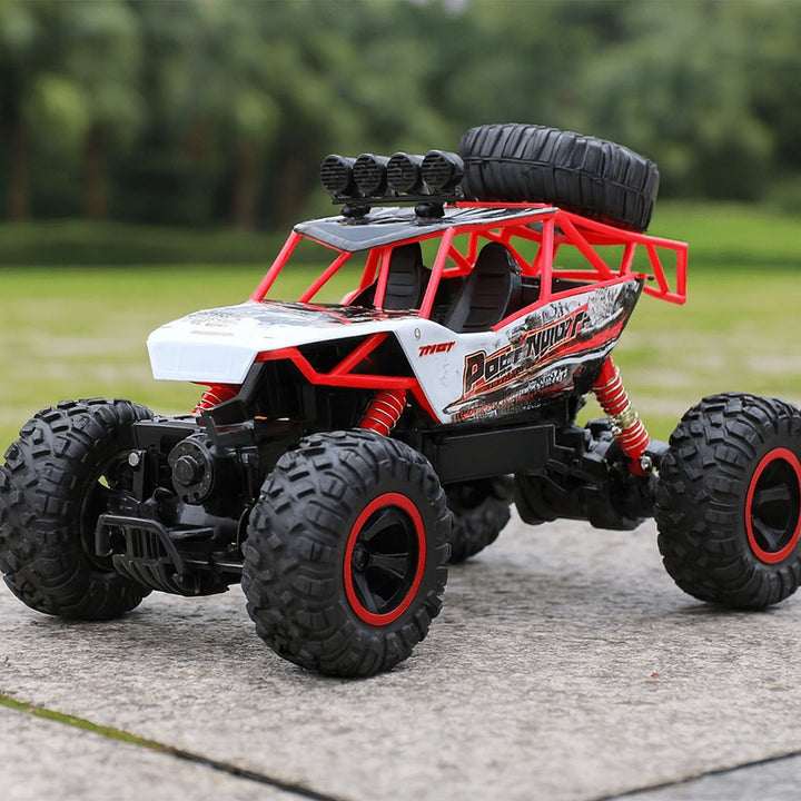 Rugged 4x4 remote control monster truck with large rubber tires - product photo 12