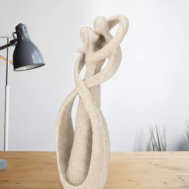 Abstract resin sculpture of two embracing figures - product photo 3