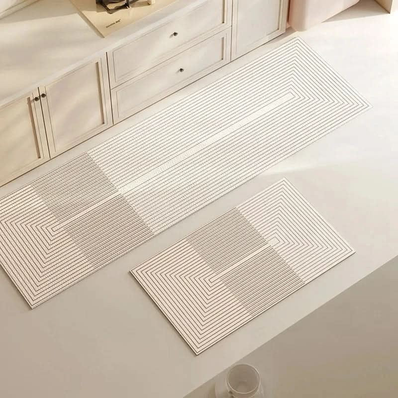 Cushioned anti-fatigue kitchen floor mat in front of a counter - product photo 3