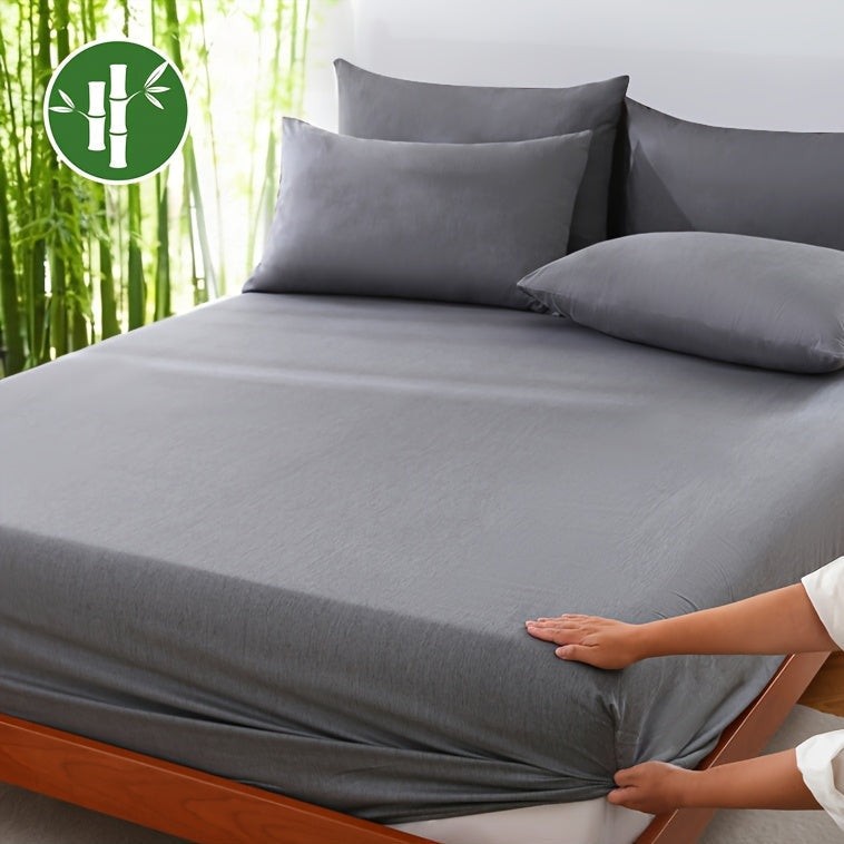Breathable bamboo-blend fitted sheet on a mattress - product photo 1