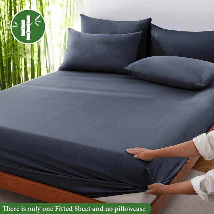Breathable bamboo-blend fitted sheet on a mattress - product photo 3