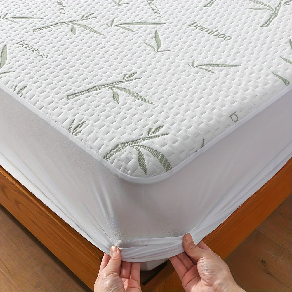 Breathable cooling mattress protector on a bed - product photo 1