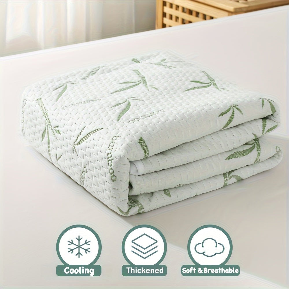 Breathable cooling mattress protector on a bed - product photo 2
