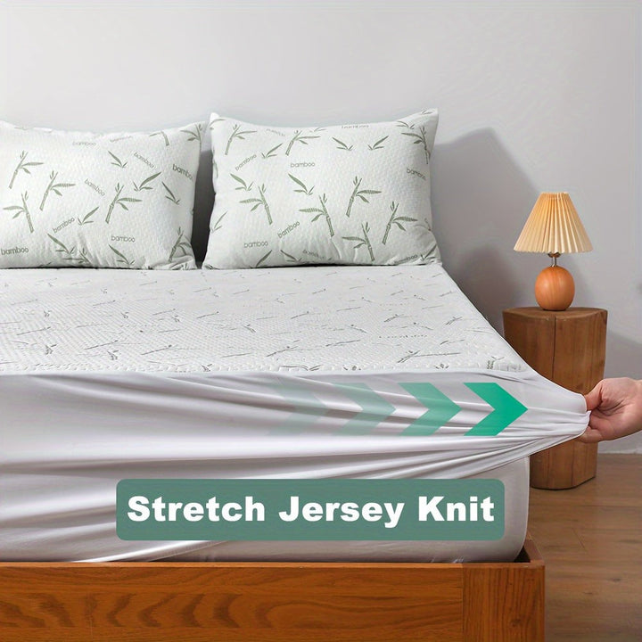 Breathable cooling mattress protector on a bed - product photo 6