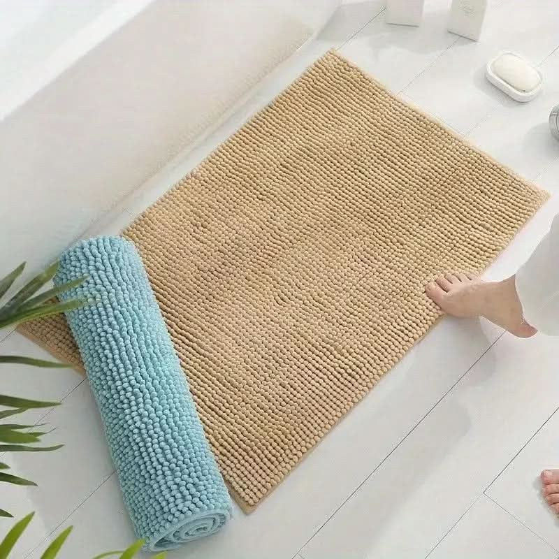 Chenille bath mat with a non-slip backing on a bathroom floor - product photo 4