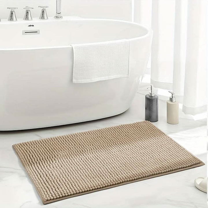 Chenille bath mat with a non-slip backing on a bathroom floor - product photo 6