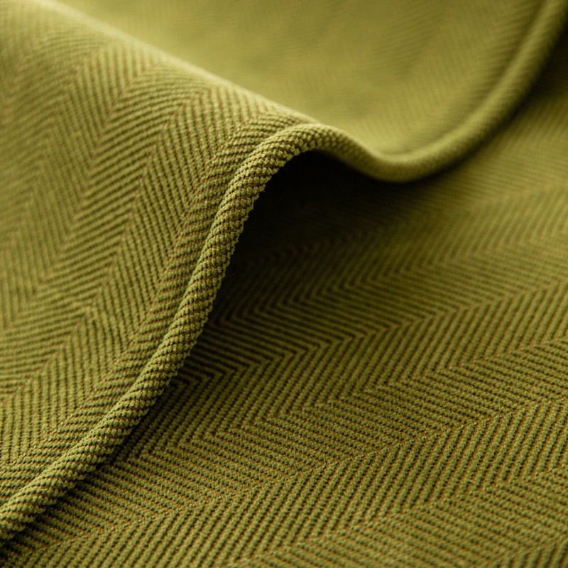 Chenille herringbone sofa cover on a couch - product photo 3