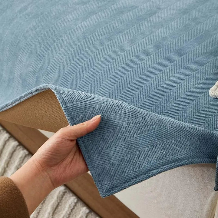 Chenille herringbone sofa cover on a couch - product photo 5