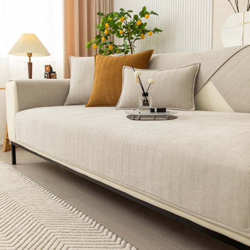 Chenille herringbone sofa cover on a couch - product photo 9
