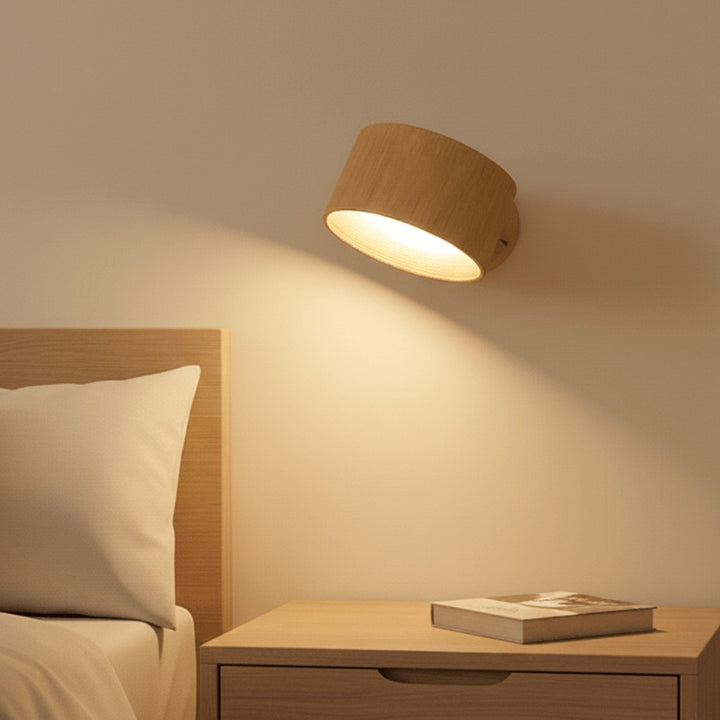 Cordless LED wall lamp casting a warm glow, controlled by remote - product photo 1