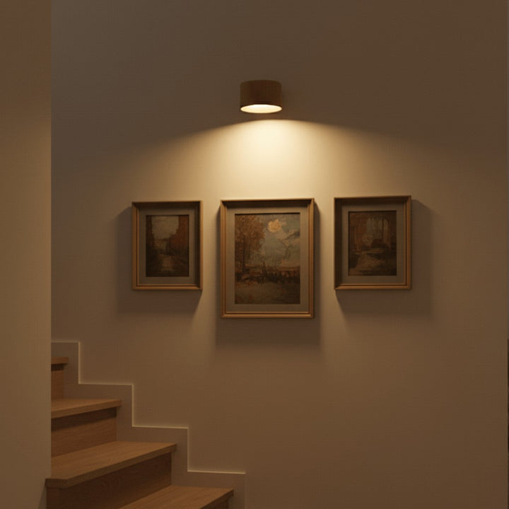 Cordless LED wall lamp casting a warm glow, controlled by remote - product photo 2