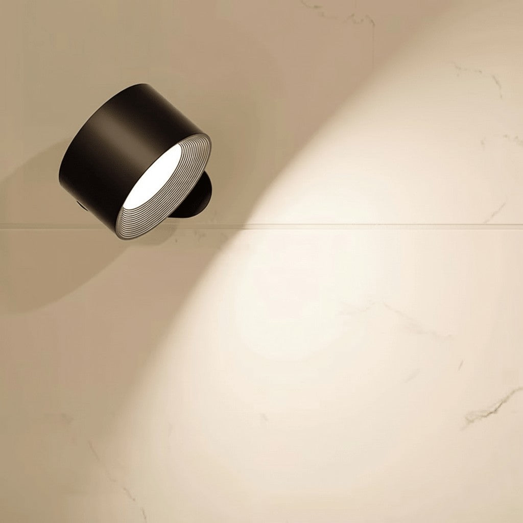 Cordless LED wall lamp casting a warm glow, controlled by remote - product photo 5