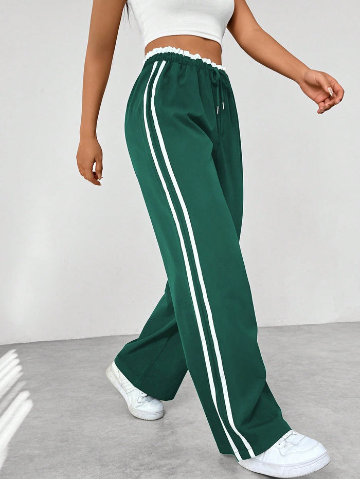 Madison | Women’s Sporty High-Waisted Jogger Pants in Black with White Stripes