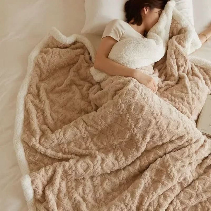 Double-sided sherpa and flannel blanket folded on a bed - product photo 4