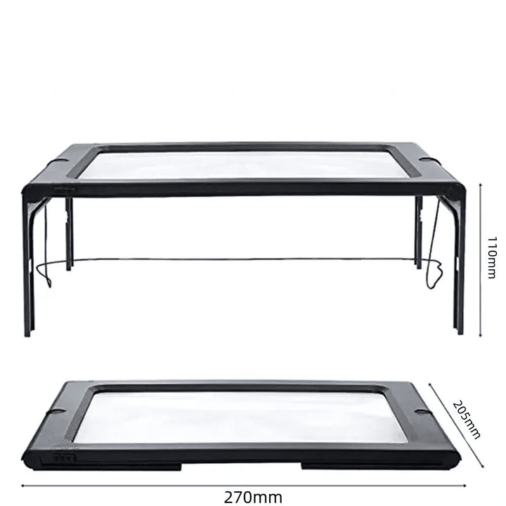 Foldable page magnifier with LED lighting standing over a book - product photo 3