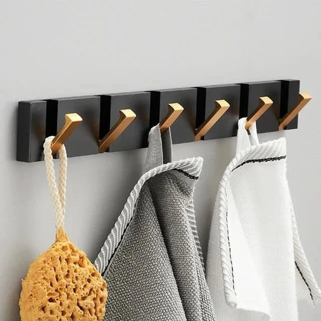 Foldable aluminum wall hooks folded flat against their rail - product photo 13