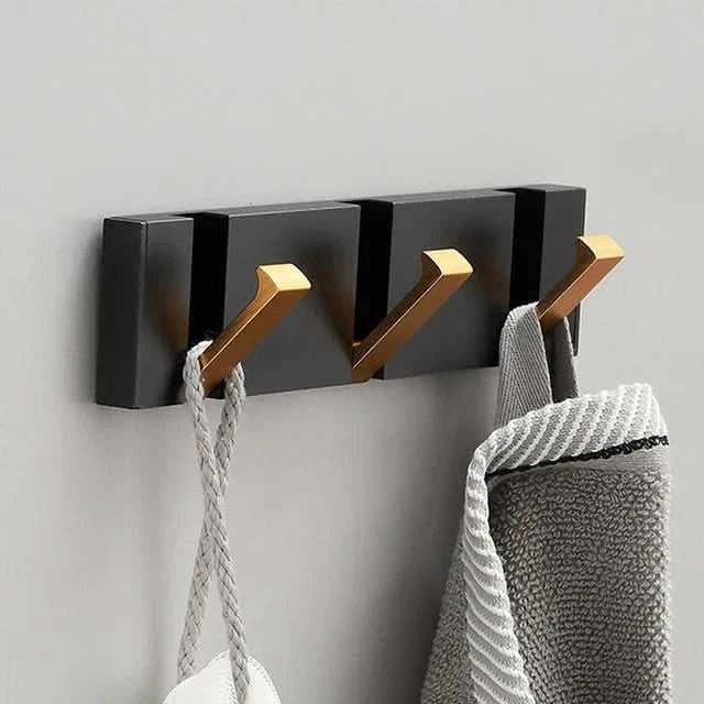 Foldable aluminum wall hooks folded flat against their rail - product photo 8