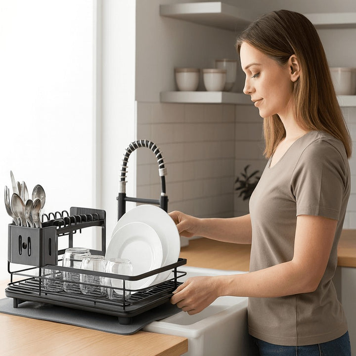 Foldable stainless steel dish drying rack beside a sink - product photo 5