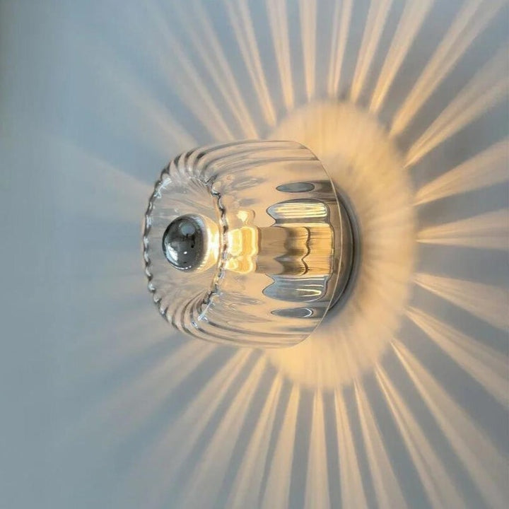 Frosted glass globe wall light on a metal base - product photo 1