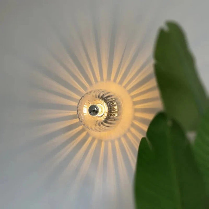 Frosted glass globe wall light on a metal base - product photo 8