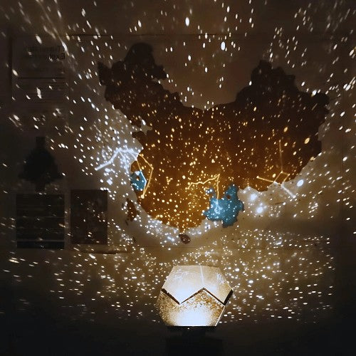 Galaxy projector casting stars across a ceiling - product photo 3
