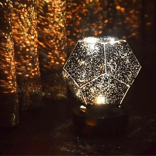 Galaxy projector casting stars across a ceiling - product photo 4