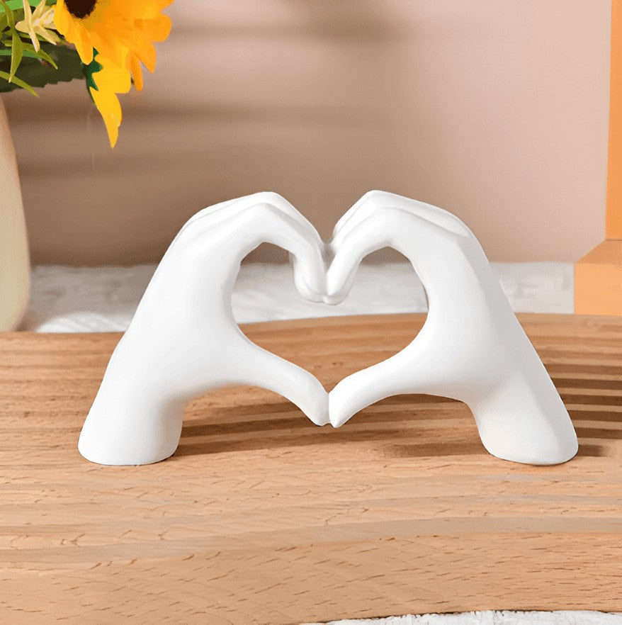 Hand-carved wooden sculpture of two embracing forms on a shelf - product photo 10