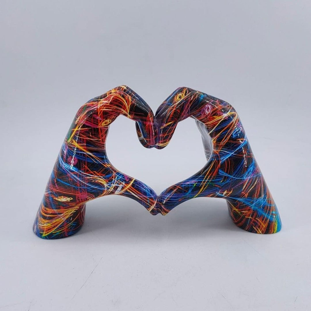 Hand-carved wooden sculpture of two embracing forms on a shelf - product photo 5