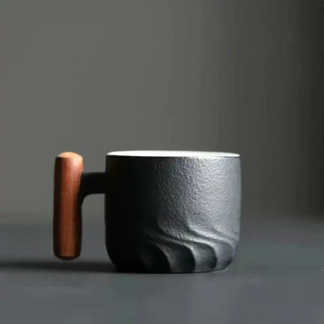 Handmade ceramic cup with a wooden handle - product photo 4