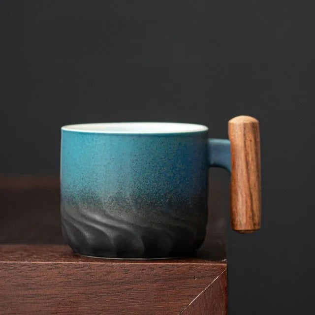 Handmade ceramic cup with a wooden handle - product photo 6