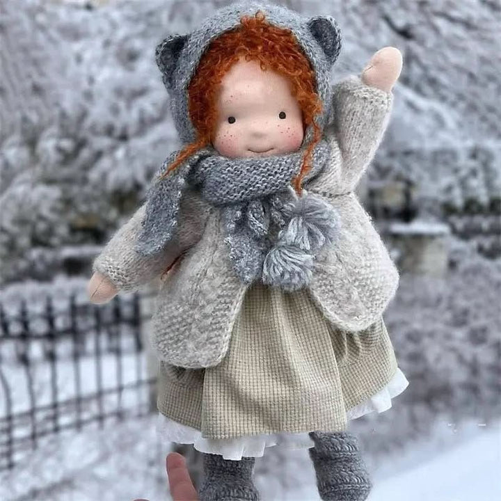 Handmade cotton Waldorf doll dressed in a knitted outfit - product photo 11
