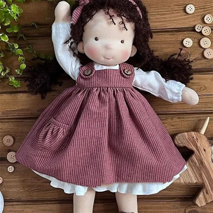 Handmade cotton Waldorf doll dressed in a knitted outfit - product photo 14