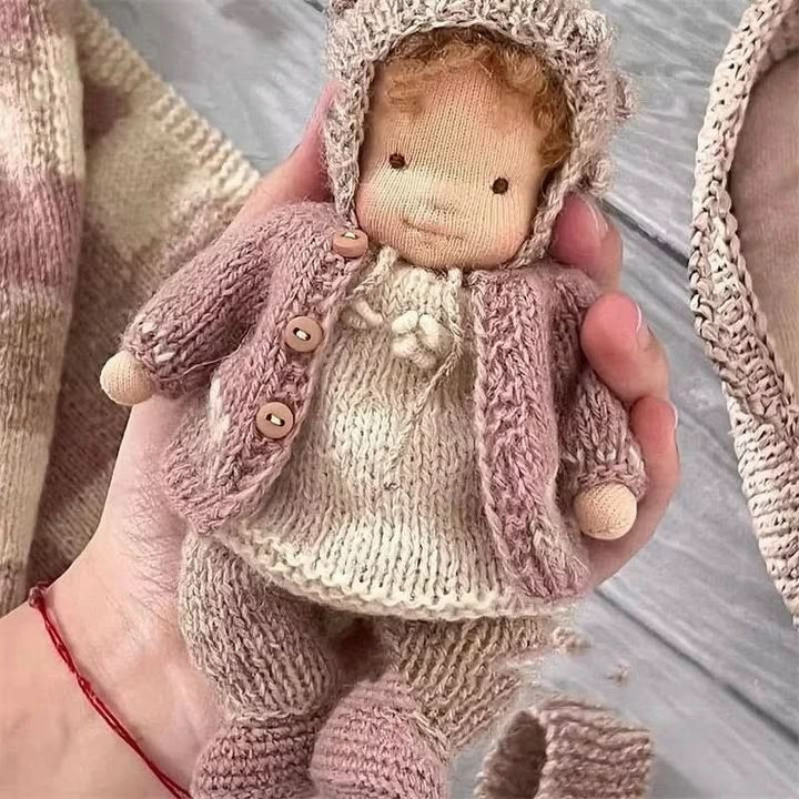 Handmade cotton Waldorf doll dressed in a knitted outfit - product photo 5