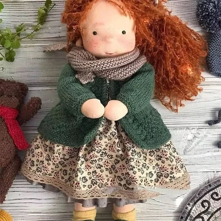 Handmade cotton Waldorf doll dressed in a knitted outfit - product photo 6