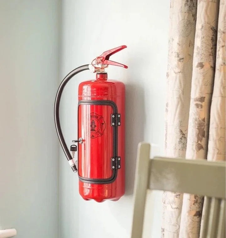 Fire extinguisher that opens into a hidden drinks cabinet - product photo 5
