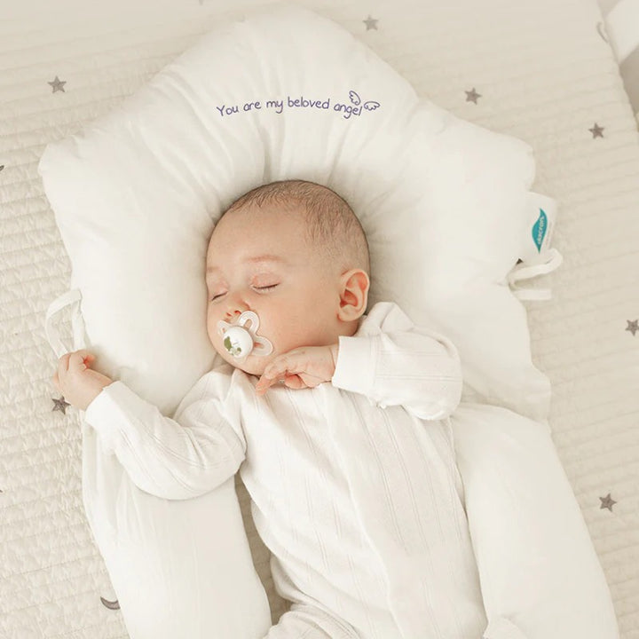 Hypoallergenic contoured baby head support pillow - product photo 1
