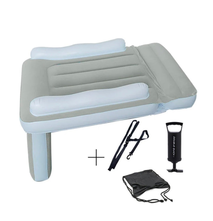 Inflatable airplane footrest bed set up in a seat - product photo 2