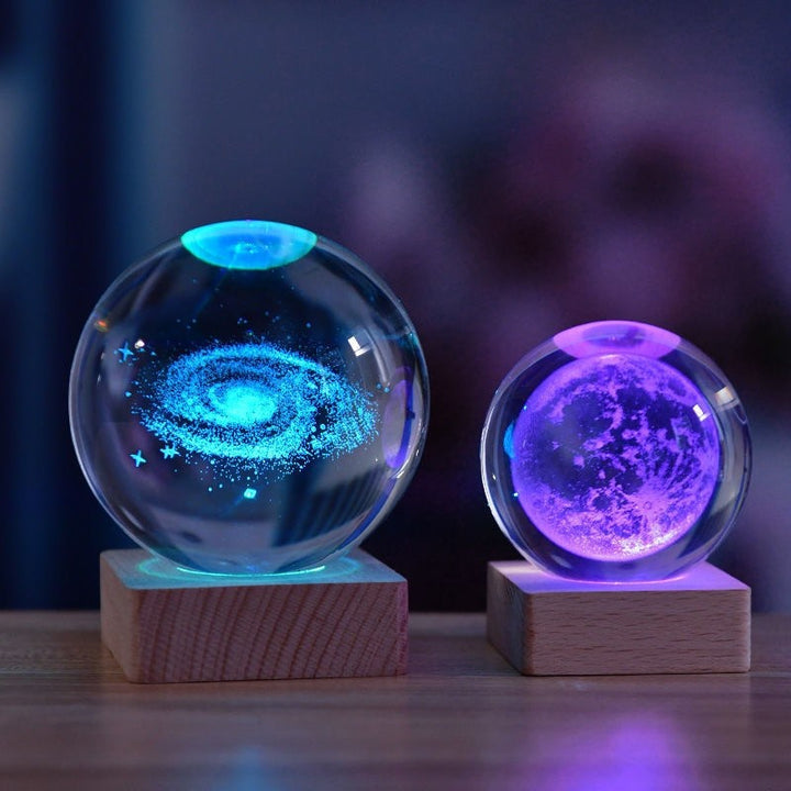 Laser-etched crystal ball lamp lit from its base - product photo 1