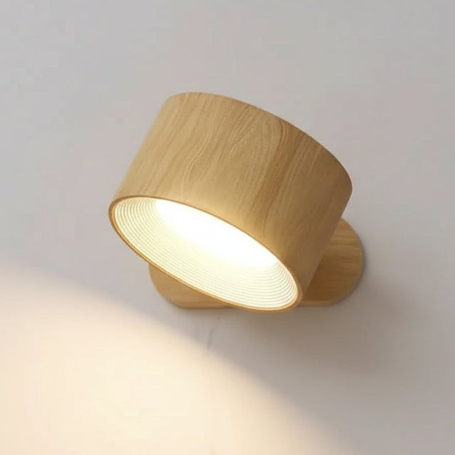 Magnetic LED wall light rotating on its mount - product photo 1