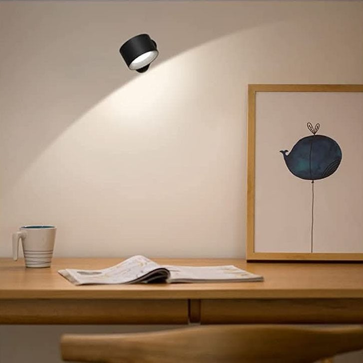 Magnetic LED wall light rotating on its mount - product photo 4