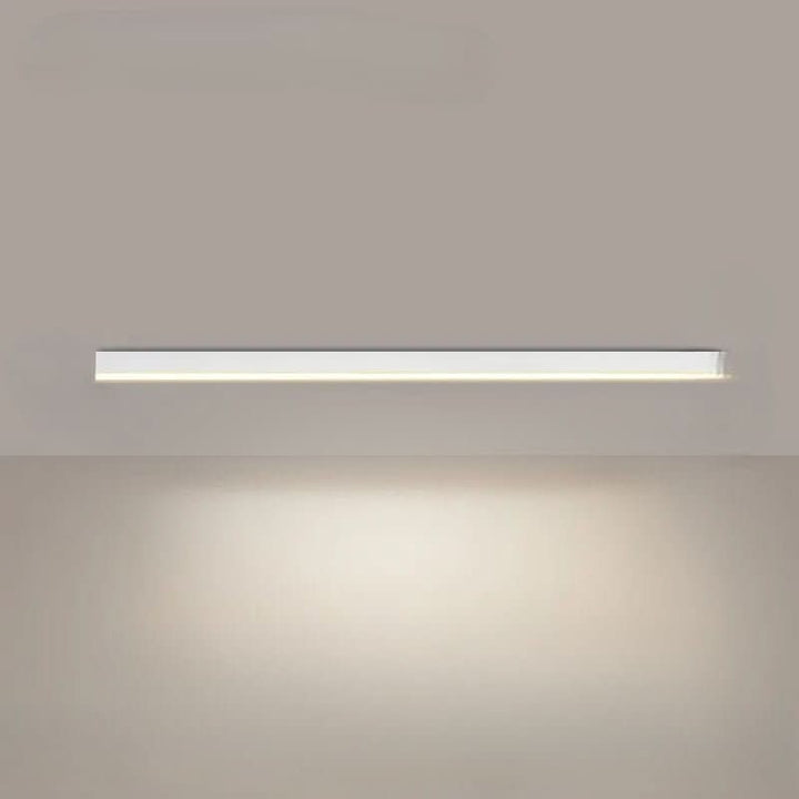 Minimalist linear LED ceiling bar lamp lighting a modern room - product photo 12