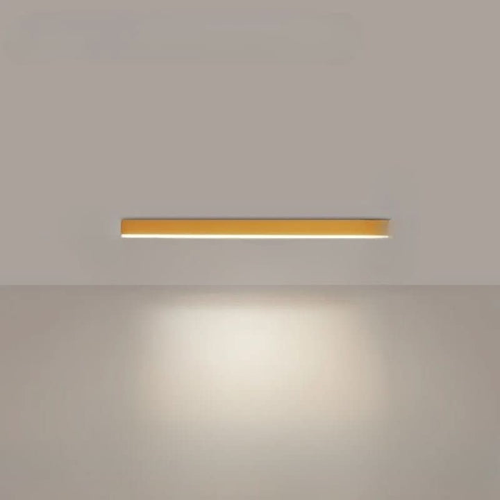 Minimalist linear LED ceiling bar lamp lighting a modern room - product photo 16