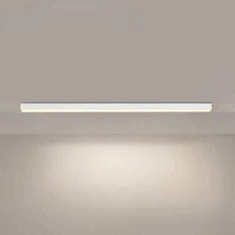 Minimalist linear LED ceiling bar lamp lighting a modern room - product photo 20