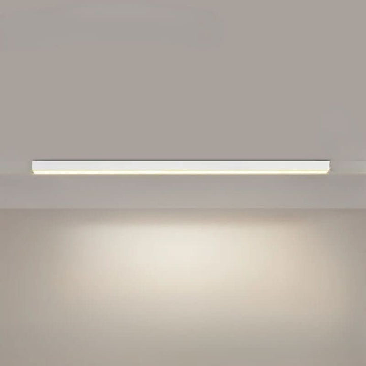 Minimalist linear LED ceiling bar lamp lighting a modern room - product photo 20