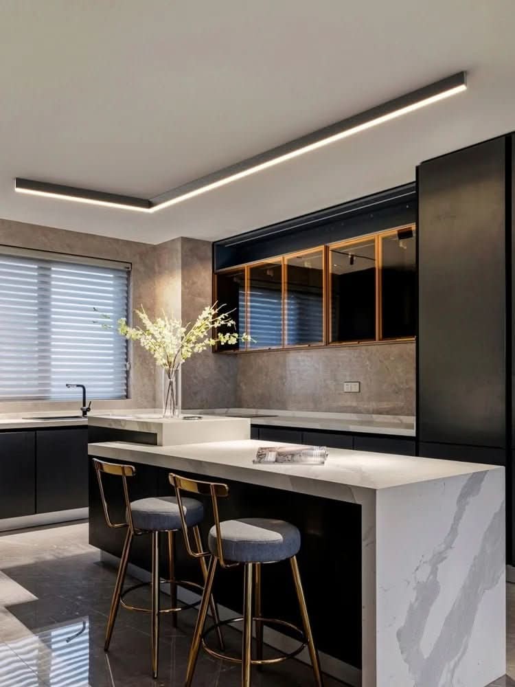 Minimalist linear LED ceiling bar lamp lighting a modern room - product photo 7