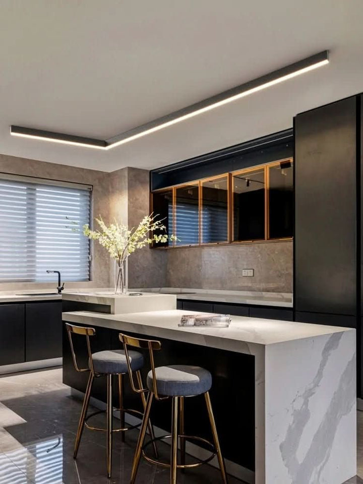 Minimalist linear LED ceiling bar lamp lighting a modern room - product photo 7