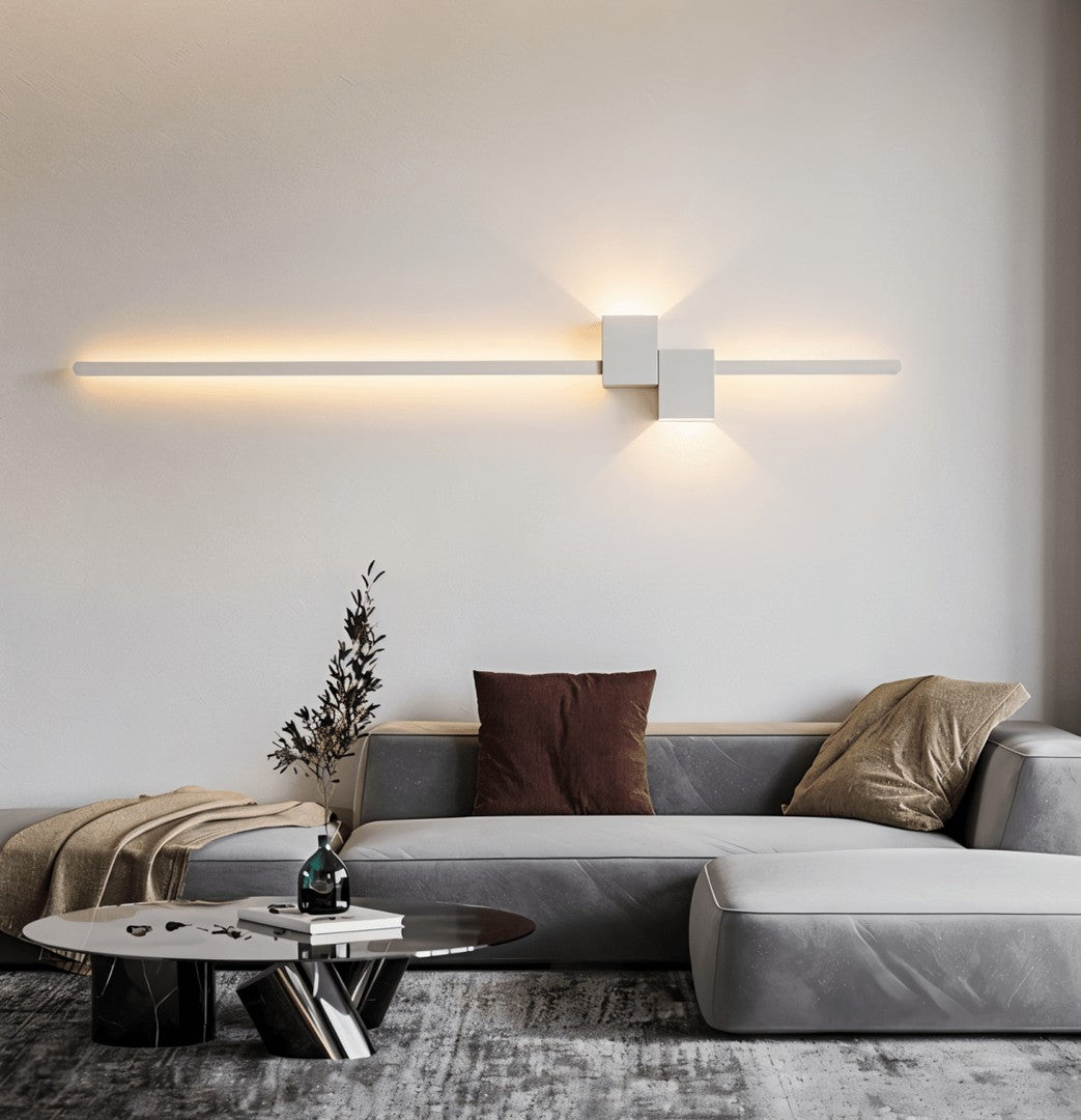 Minimalist linear LED wall light casting a soft glow along a wall - product photo 3