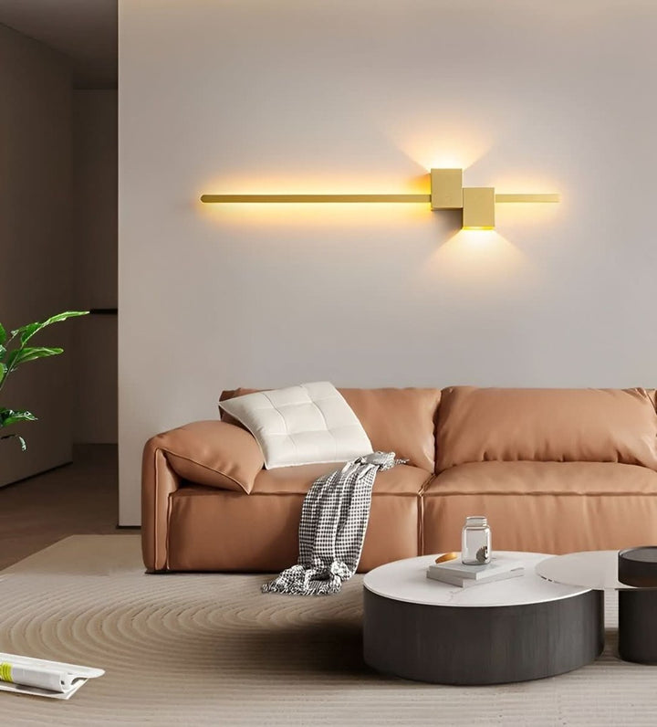 Minimalist linear LED wall light casting a soft glow along a wall - product photo 4