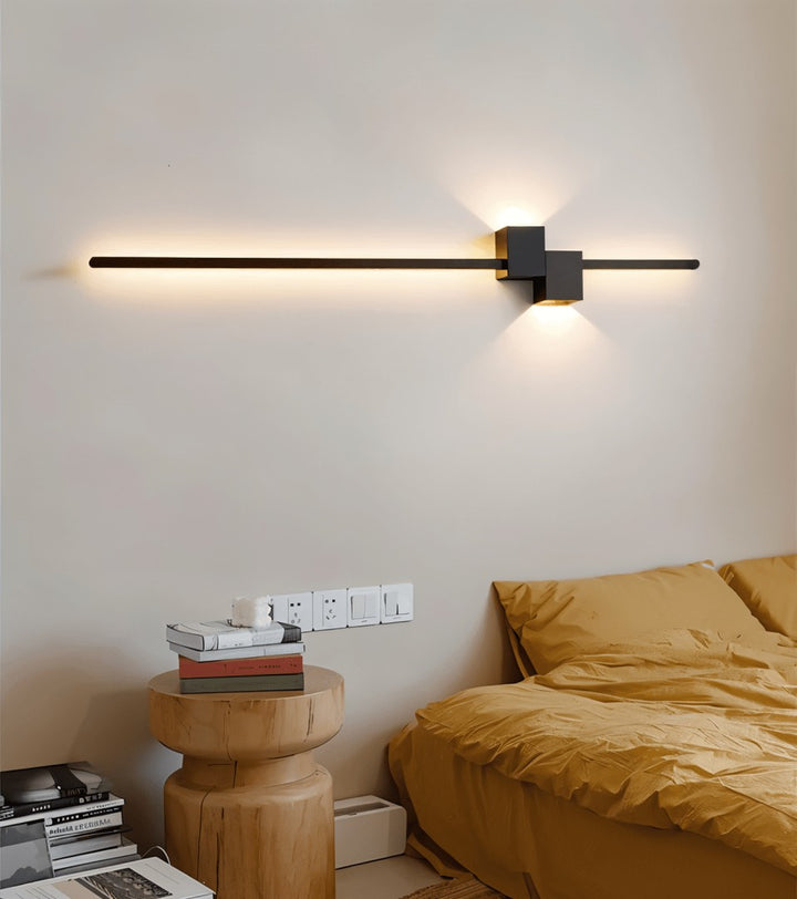Minimalist linear LED wall light casting a soft glow along a wall - product photo 5