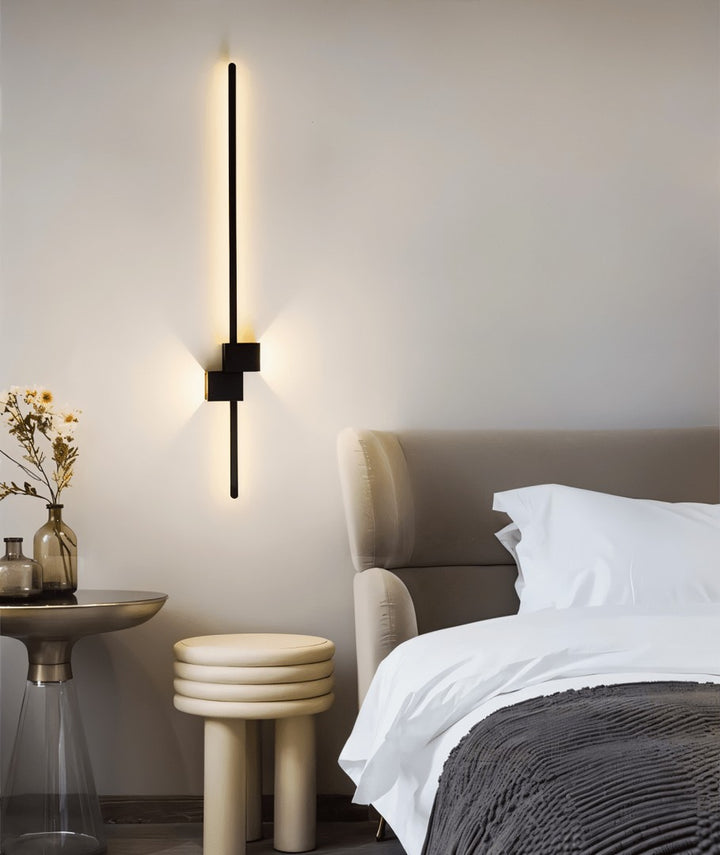 Minimalist linear LED wall light casting a soft glow along a wall - product photo 8